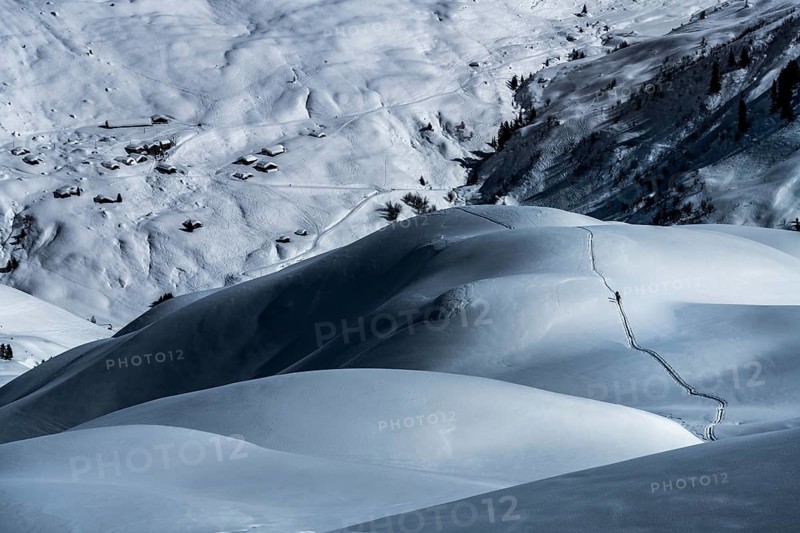 Ski mountaineers in winter landscape
