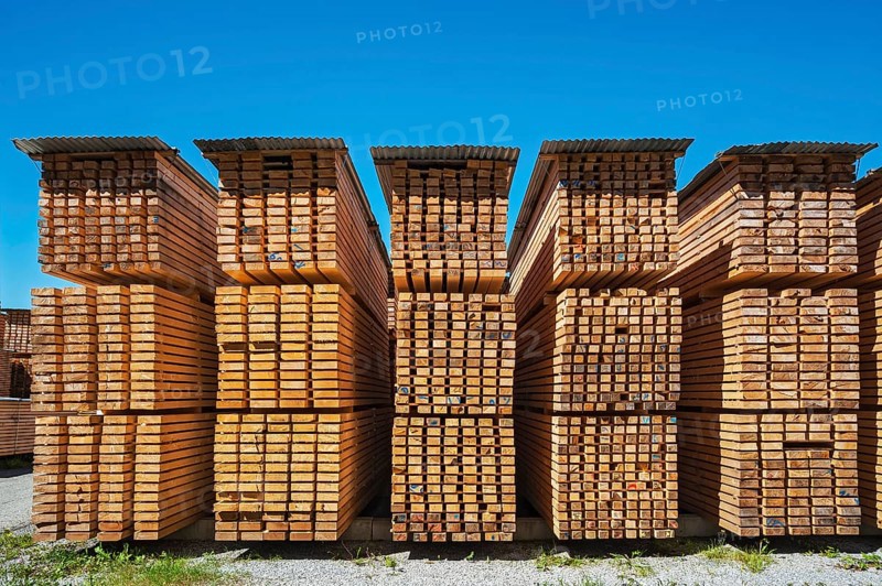 Stacked wooden slats and boards in a sawmill