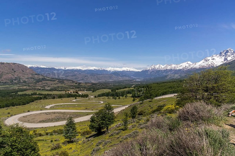 View of Carretera Austral with snow-covered mountain range