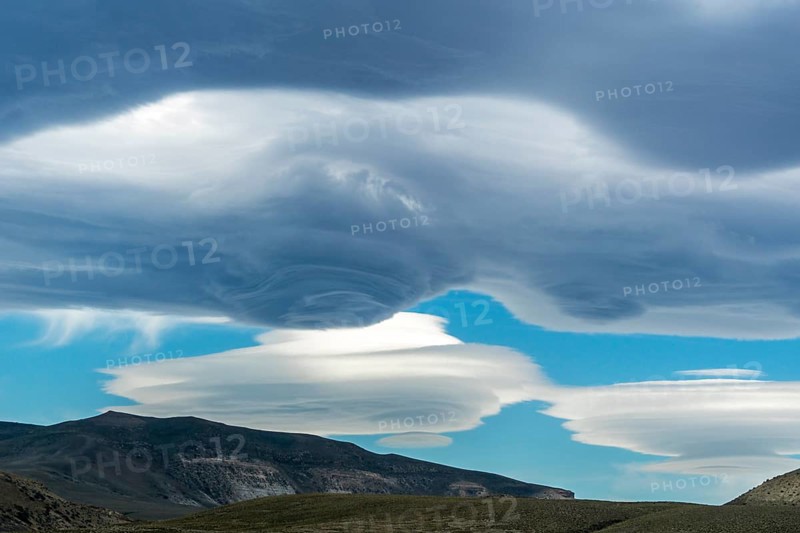 Lenticularis clouds over the mountains at Lago Viedma