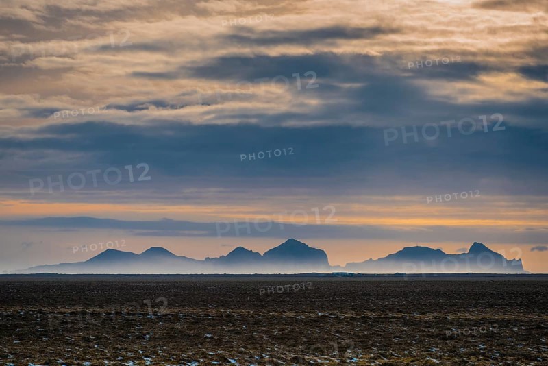 View from the mainland to the Westman Islands with cloudy sky