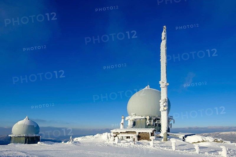 Radome and antenna at the summit in winter