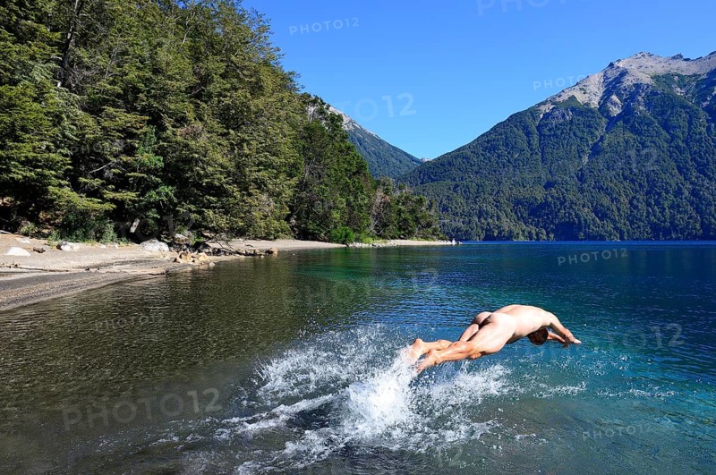 Naked man jumps headlong into cold water