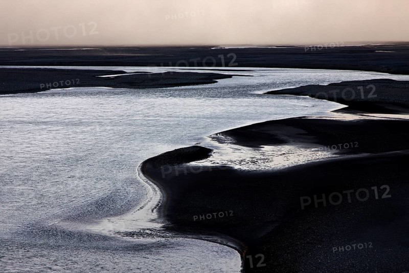 Glacial runoff permeate the volcanic sand plain Skeidararsandur