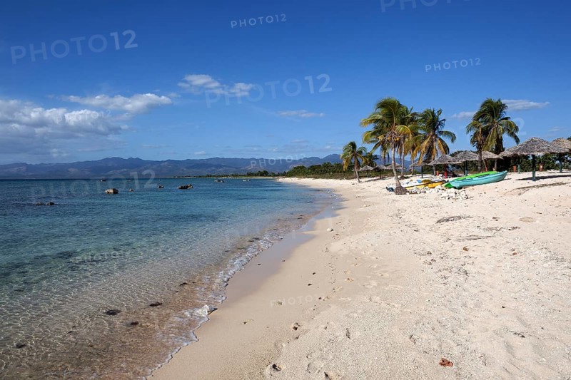 Tropical beach with palm trees at Playa Ancon