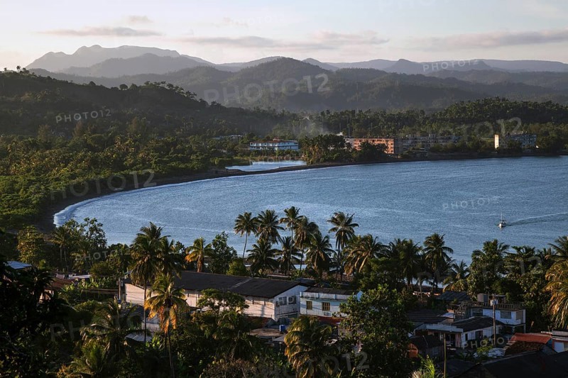 View of houses and the Bahia de Miel bay