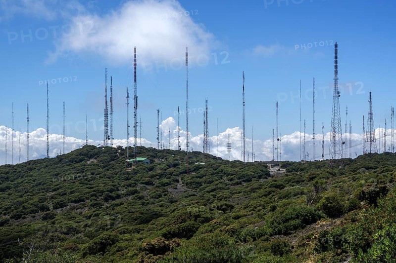 Many transmitter masts on mountain ridges