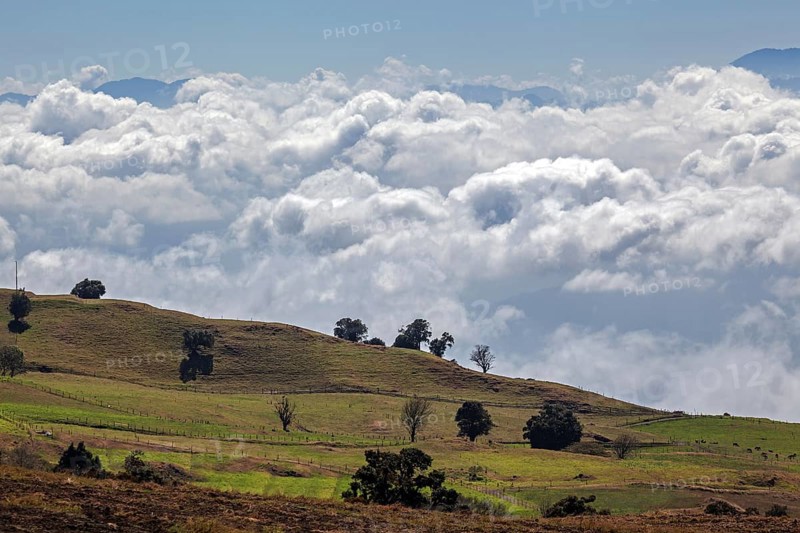 View from the southern slope of Irazu Volcano to the cultural landscape and cloud cover