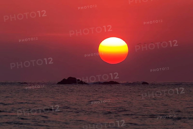 Red glowing sunset over the sea
