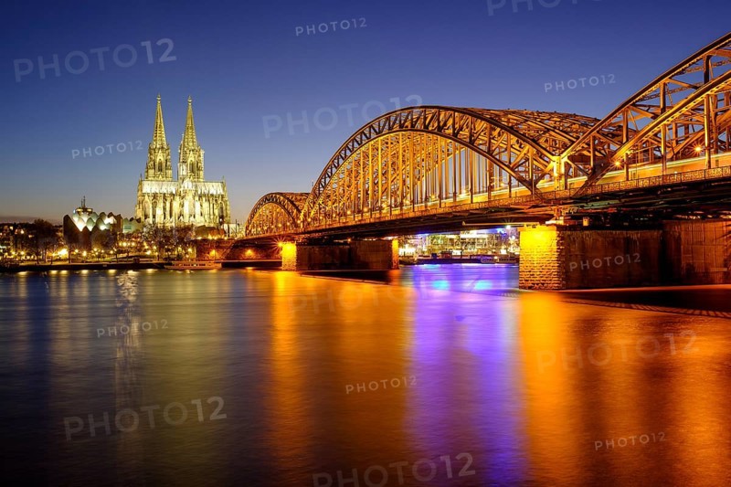 Cologne Cathedral with Hohenzollern Bridge over the Rhine