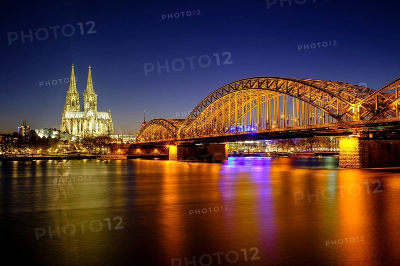 Cologne Cathedral with Hohenzollern Bridge over the Rhine