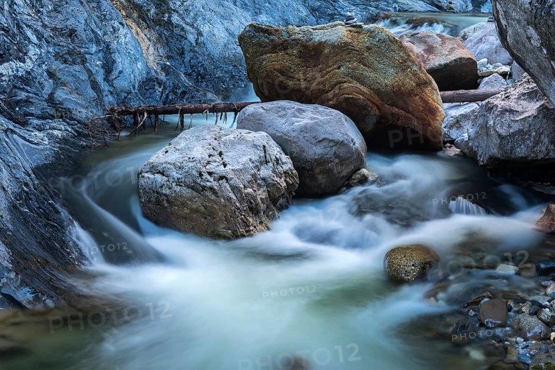 Water flowing around rocks