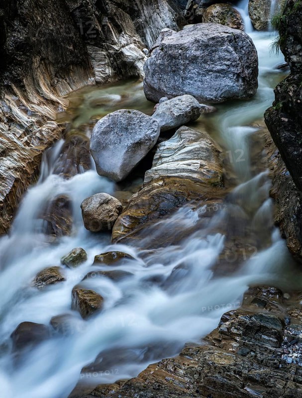 Water flowing around rocks