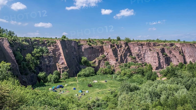 Disused quarry with tents
