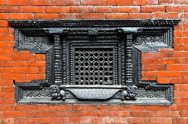 Artfully carved window grilles in traditional Newar style in Kumari Chowk inner courtyard