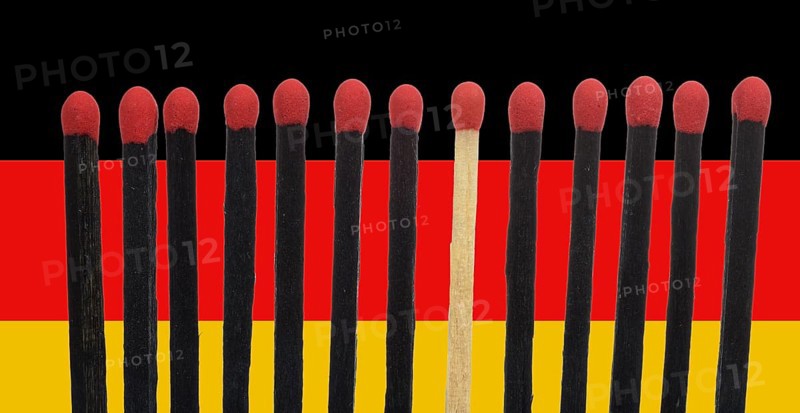 A bright match among several black matches