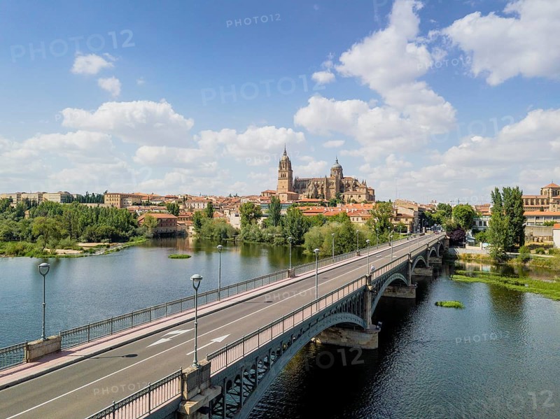 Cityscape of Salamanca with bridge over Tormes river and cathedral
