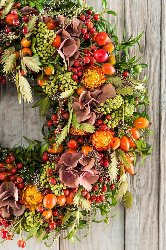 Autumn wreath cutout on wooden wall