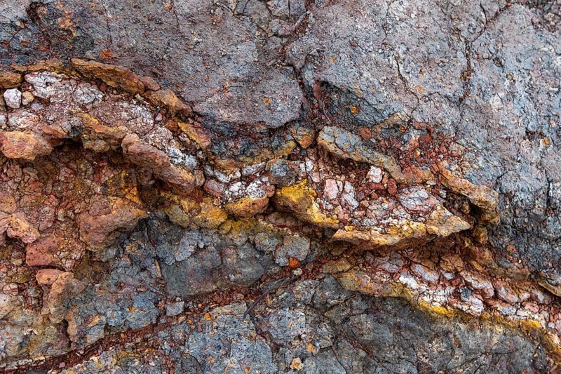 Various colorful rock layers in the rock