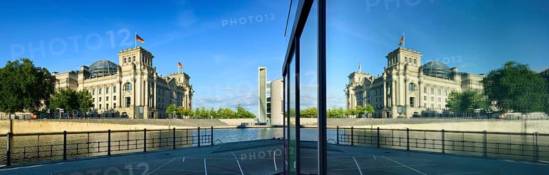 Reichstag reflected in glass facade of Marie-Elisabeth-Luders-Haus