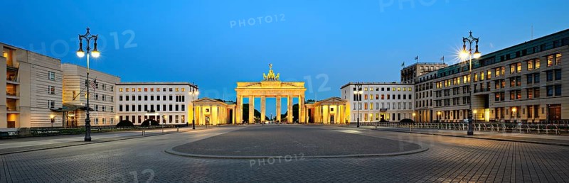 Pariser Platz with illuminated Brandenburg Gate at dawn