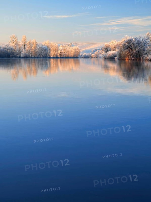 River landscape in winter at the river Saale