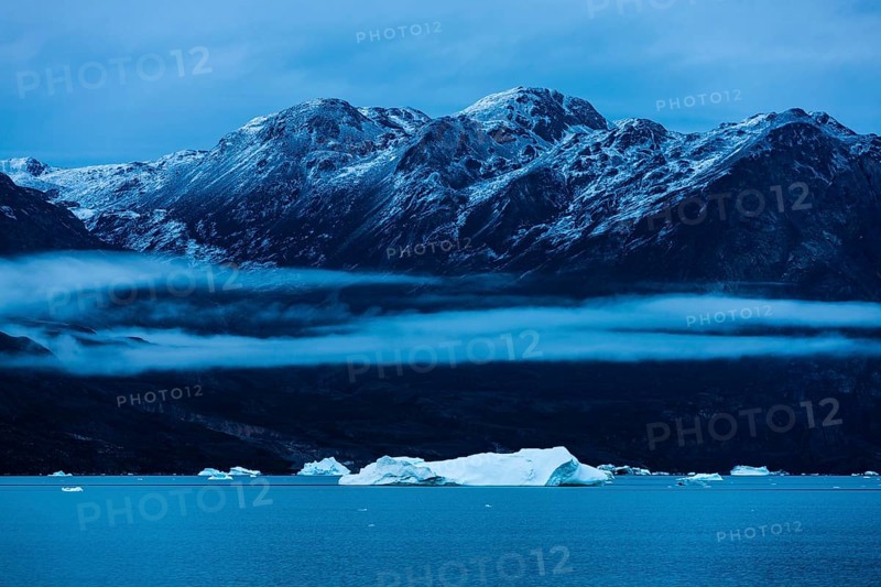 Drift ice in Scoresbysund at dawn