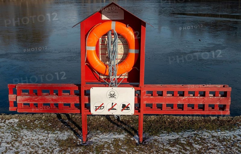 Lifebelt at frozen lake