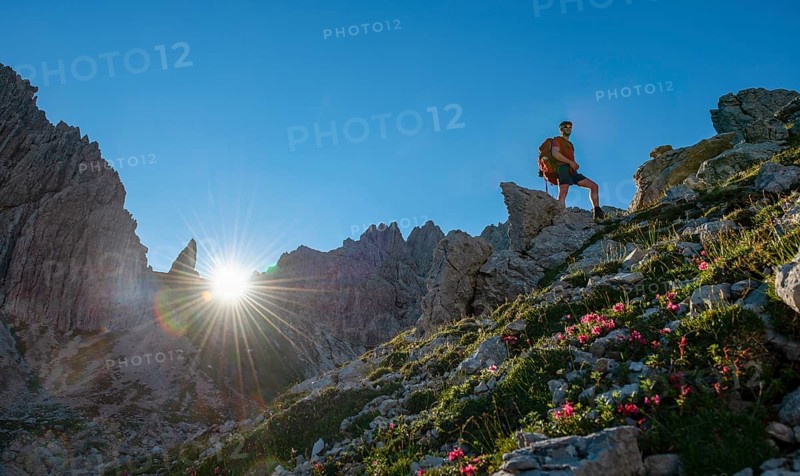 Hiker stands on a rock