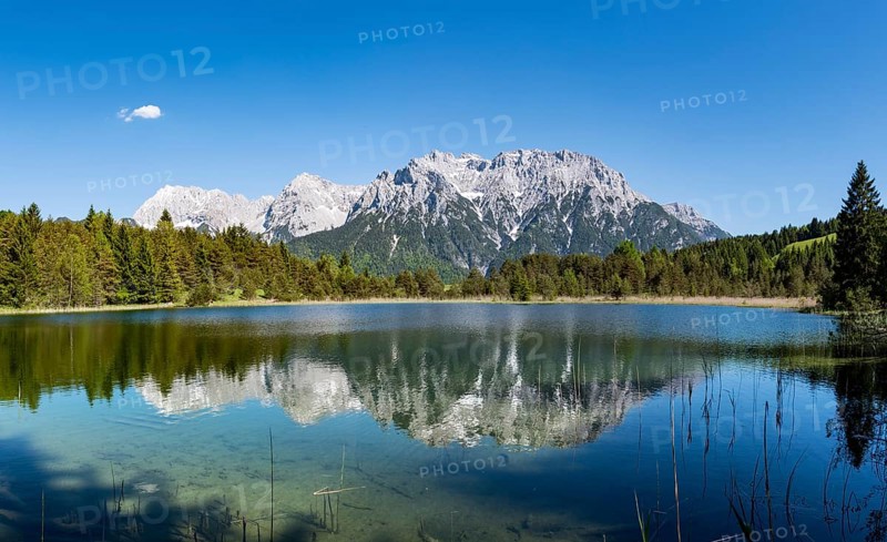 Western Karwendelspitze reflected in Lake Luttensee