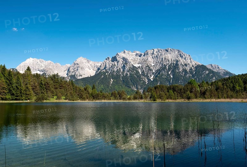 Western Karwendelspitze reflected in Lake Luttensee