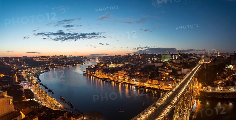 View over Porto with illuminated Ponte Dom Luis I Bridge across River Douro