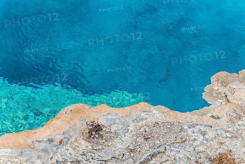 Turquoise clear water of a hot spring