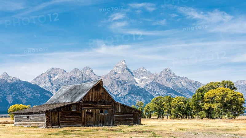 Historic old barn in front of the Teton Range mountain range