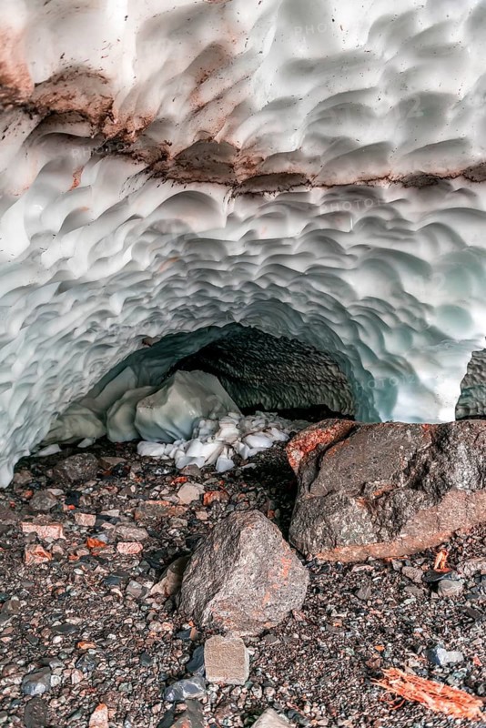 Entrance of an ice cave of a glacier