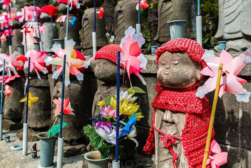 Jizo statues with red caps