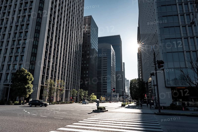 Traffic street in the city center with skyscrapers
