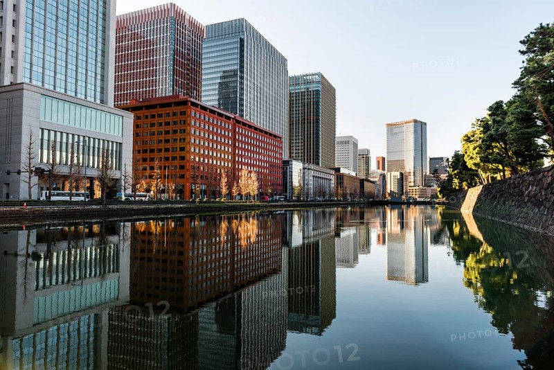 High-rise buildings reflected in a canal