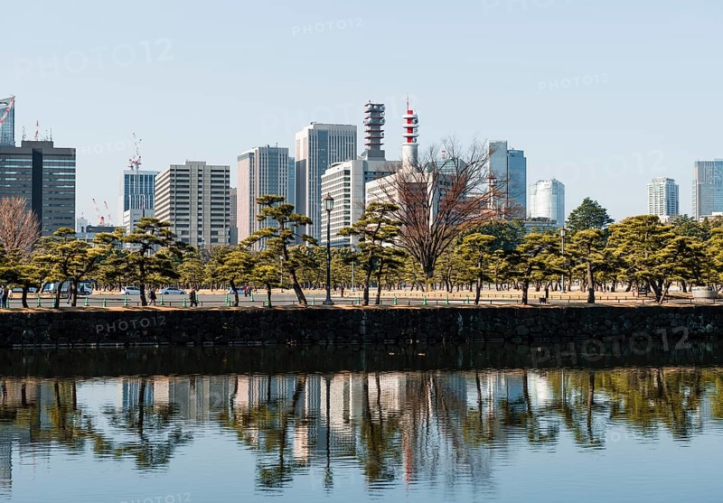 High-rise buildings reflected in a canal