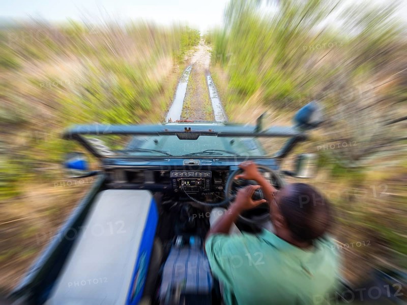 Fast ride in an open-top Jeep