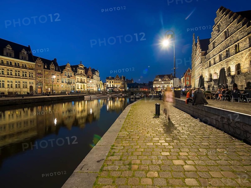 Promenade with old guildhalls on the Lys