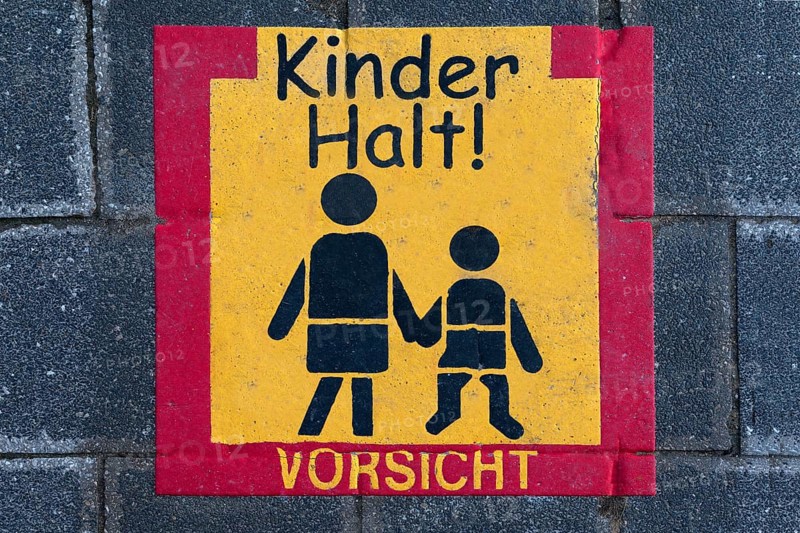 Traffic signs on a pavement