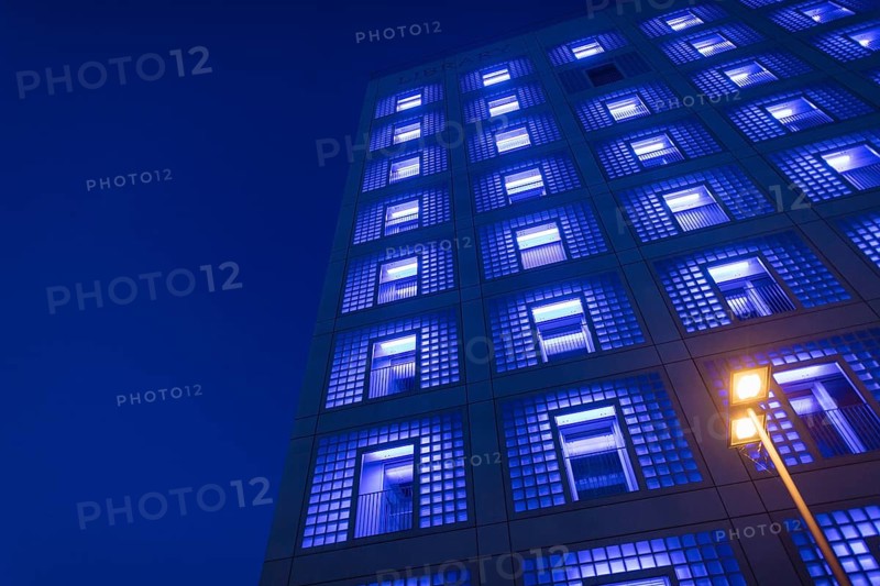 Illuminated city library at night