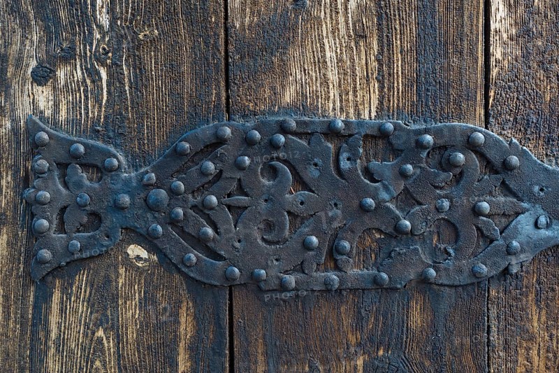 Iron door fitting