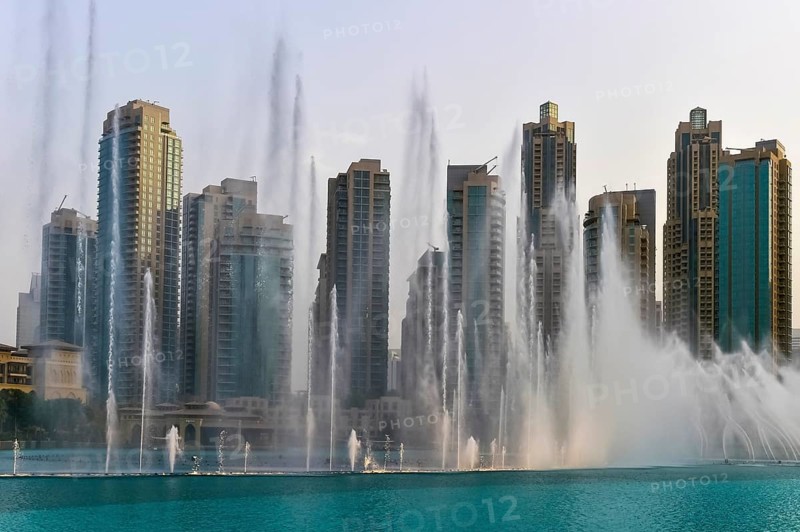 Fountains in front of skyscrapers