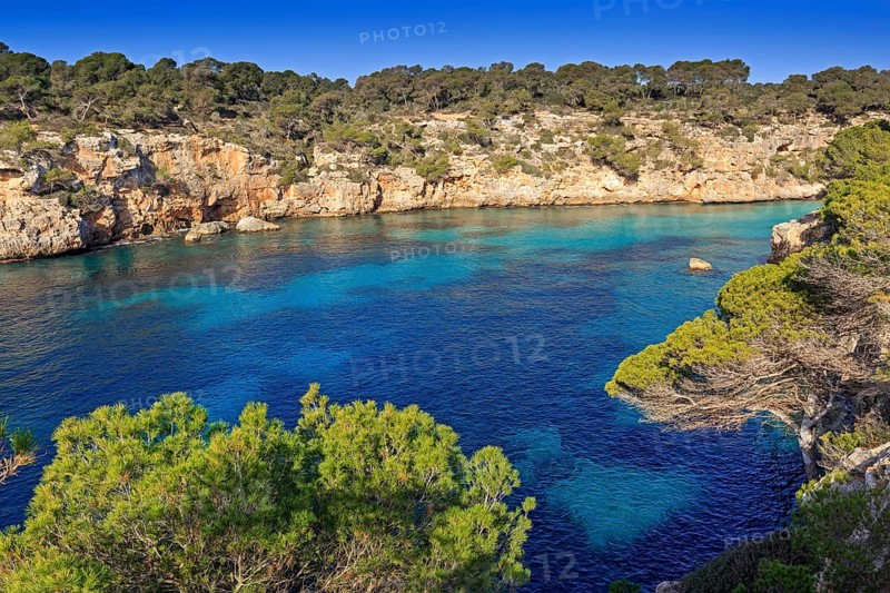 The turquoise waters in the bay of Cala Pi