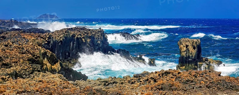 Coast with basalt cliffs
