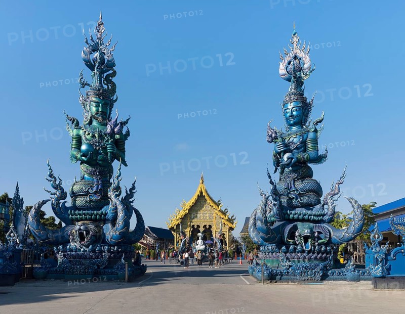 Demons sculptures at the entrance of Wat Rong Seur Ten