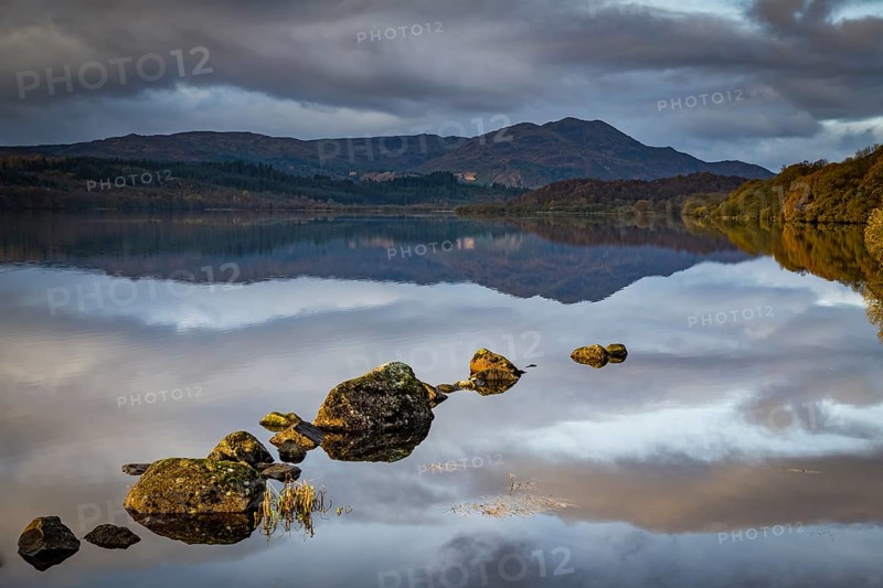 Reflection in Loch Katrine with Highlands