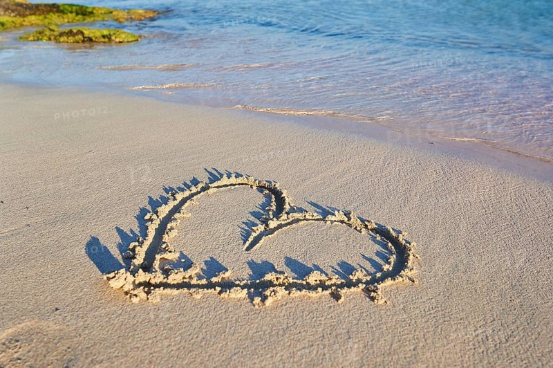 Heart paintet in sand